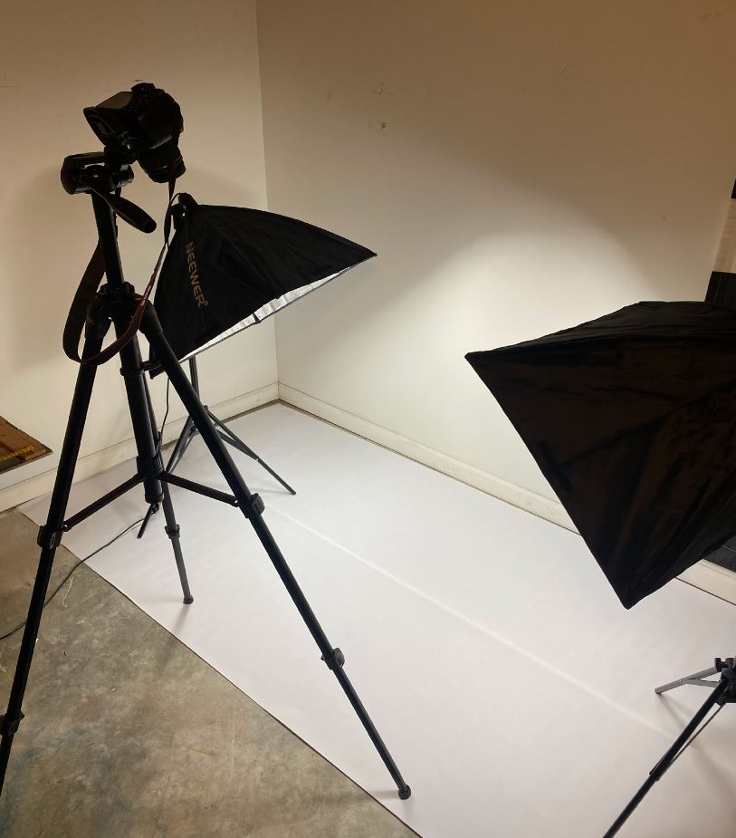 Current Barcode Garments studio setup with two softbox lights and a white backdrop.